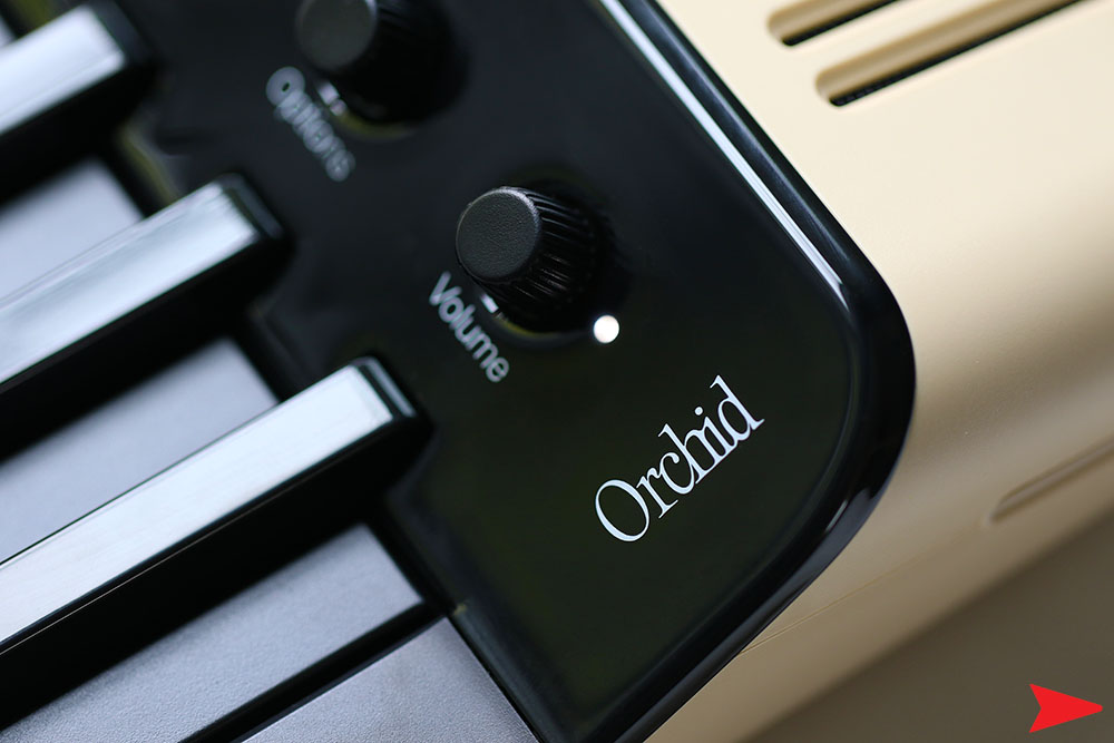 Telepathic Instruments Orchid Logo Close Up